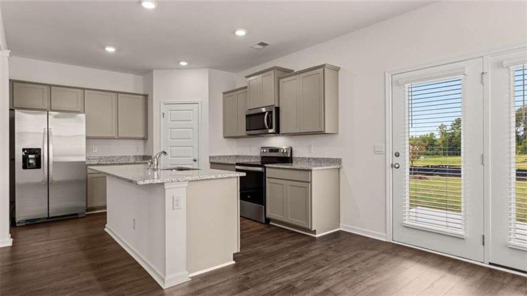 Furnished interior view inside a new home in Oakchase at Hampton, Hampton (Image 7).