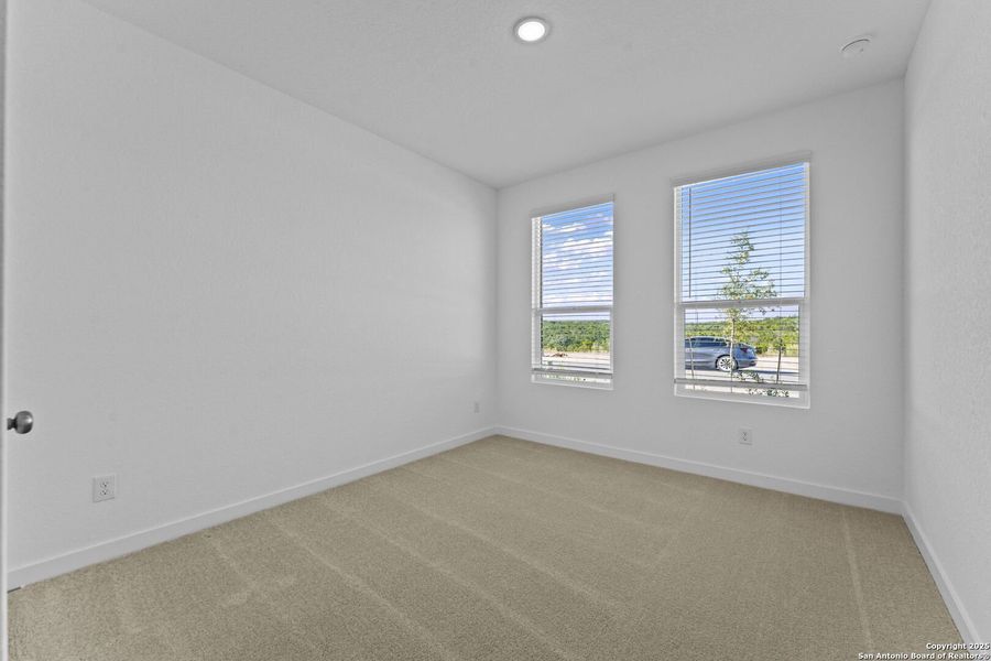 Spacious, unfurnished interior of a new home in Waterwheel: Coastline Collection, San Antonio (Image 13).