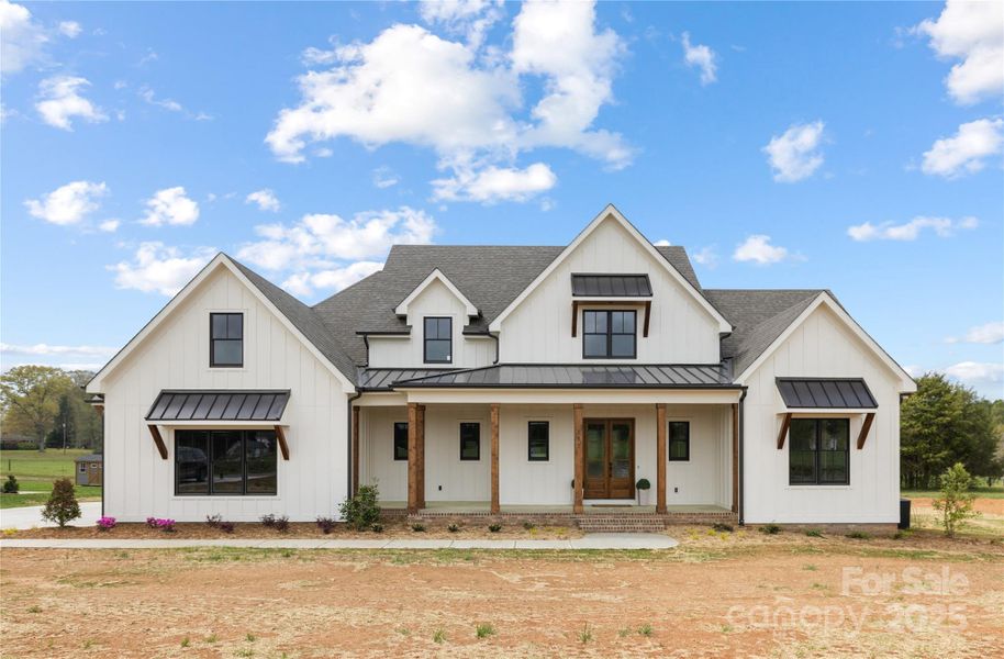 Front exterior of a new home in , Statesville, NC, highlighting curb appeal (Image 23).