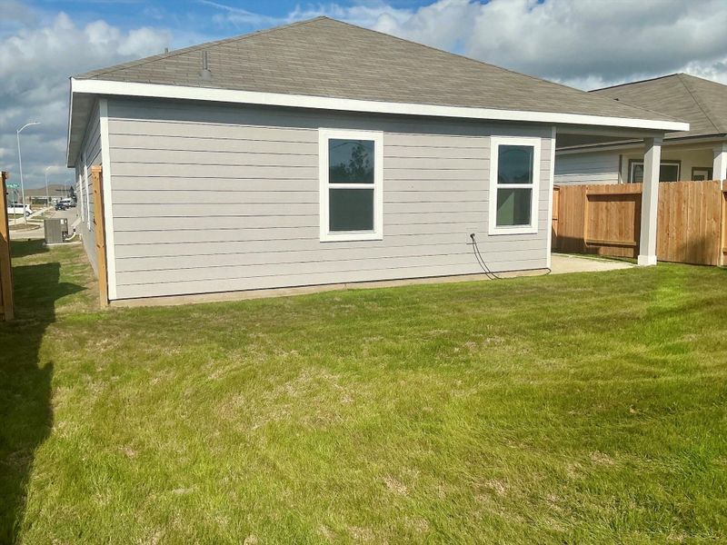 Exterior details and patio area of a home in Cedar Pointe, Crosby (Image 2).