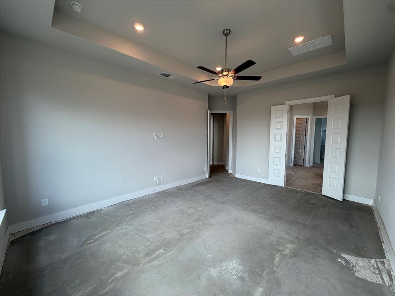 Primary Bedroom with tray ceiling
