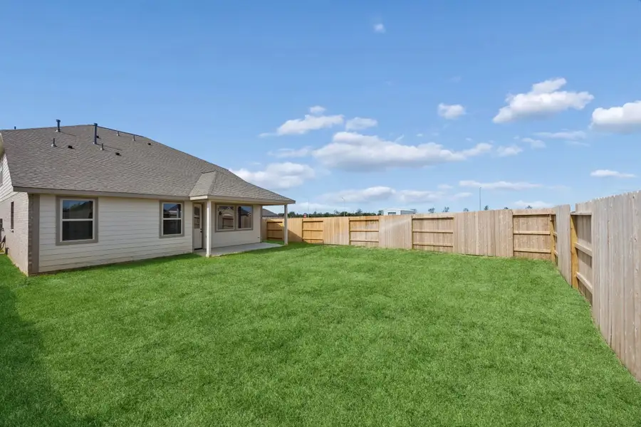 Exterior details and patio area of a home in Azalea, Brookshire (Image 3).