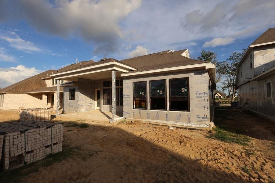 Exterior details and patio area of a home in Riceland 60’ Homesites, Mont Belvieu (Image 3). Exterior details and patio area of a home in Riceland 60’ Homesites, Mont Belvieu (Image 3).