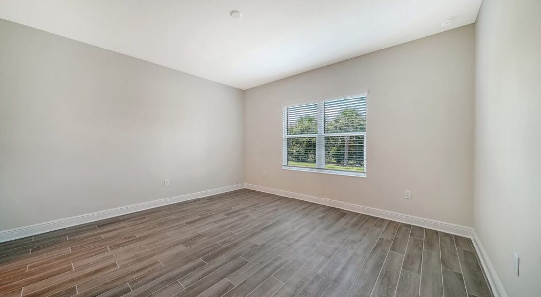 Spacious, unfurnished interior of a new home in Windward Real Estate and Homes for Sale in Sarasota, FL - Neal Communities, Lakewood Ranch (Image 23).