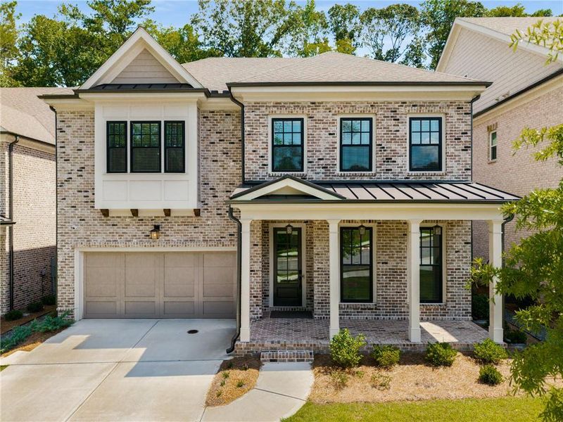 Front exterior of a new home in , Johns Creek, GA, highlighting curb appeal (Image 23). Front exterior of a new home in , Johns Creek, GA, highlighting curb appeal (Image 23).