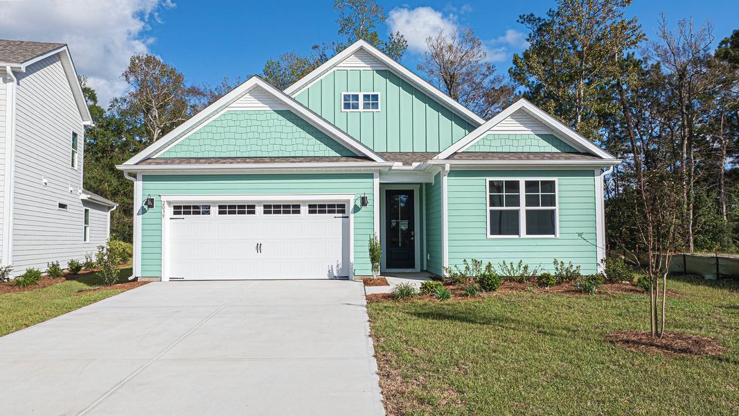 Front exterior of a new home in Rolling Hills, Bolivia, NC, highlighting curb appeal (Image 1). Front exterior of a new home in Rolling Hills, Bolivia, NC, highlighting curb appeal (Image 1).