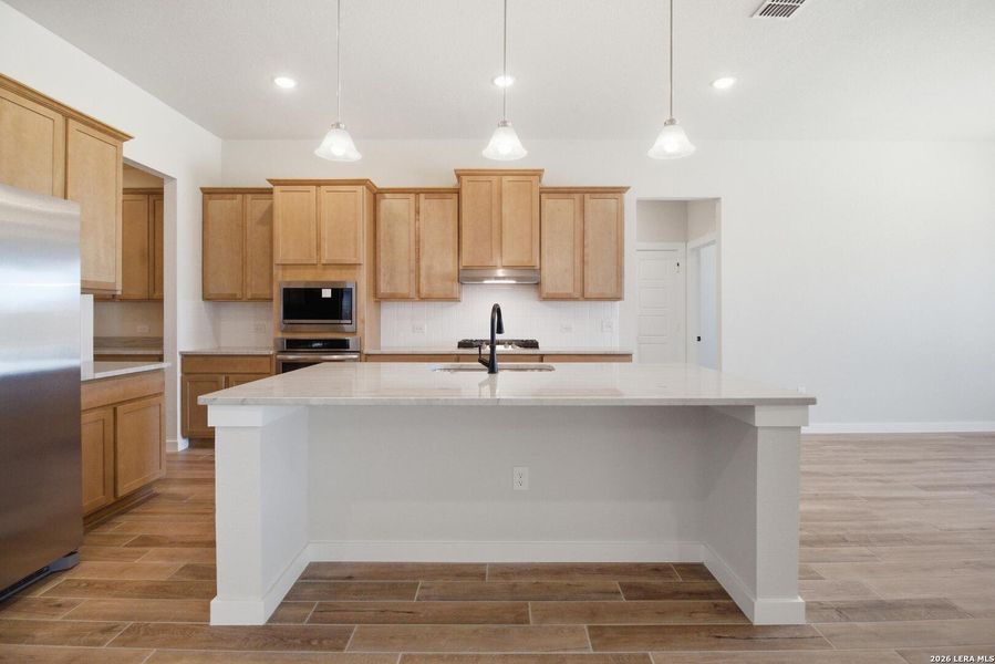 Furnished interior view inside a new home in Villas Las Flores, Floresville (Image 13). Furnished interior view inside a new home in Villas Las Flores, Floresville (Image 13).