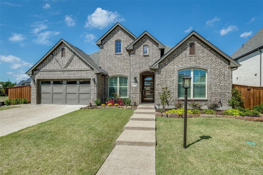 Beautiful brick home with cedar accents is ready for a new owner