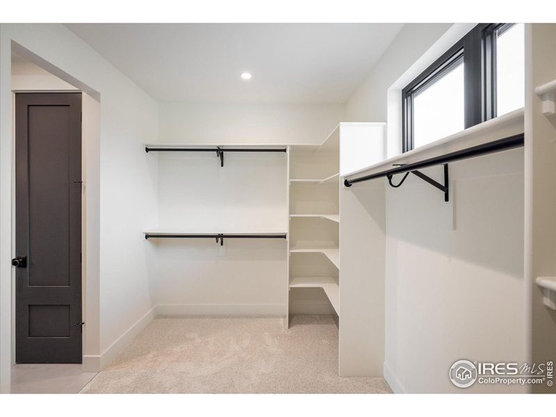 Another light-filled walk-in closet for the upstairs Primary Bedroom - and this one is HUGE