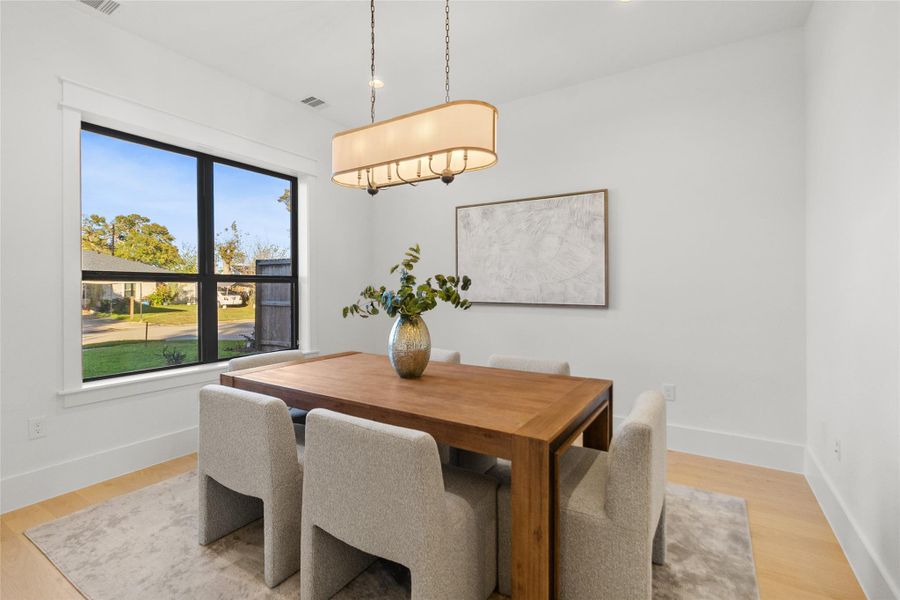 This room works the way you need it to. Whether it’s your home office, creative studio, or quiet retreat, the layout gives you breathing room to focus without distractions. Natural light pours in through oversized windows, while the clean lines and warm flooring create a balanced space that feels productive by day and peaceful after hours.