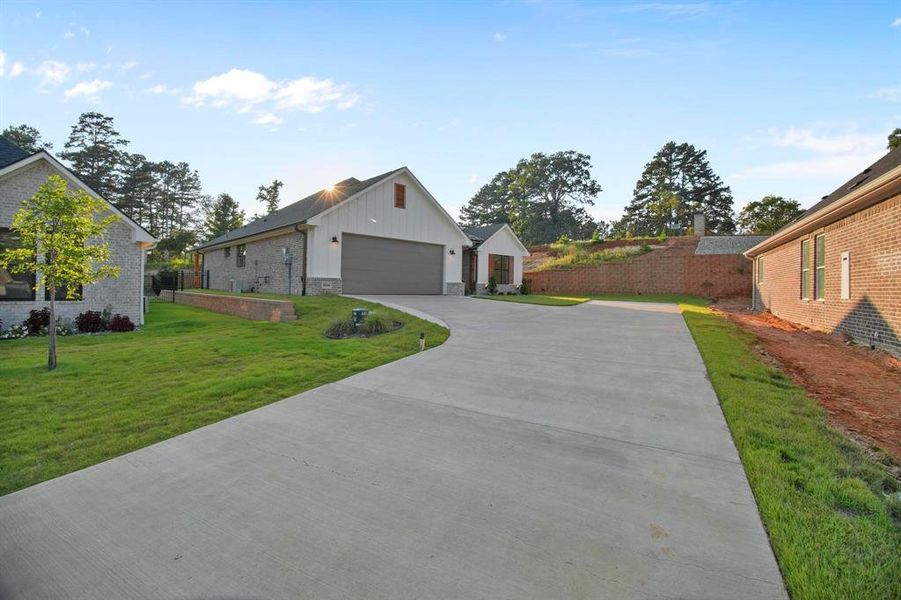 Front exterior of a new home in , Tyler, TX, highlighting curb appeal (Image 27). Front exterior of a new home in , Tyler, TX, highlighting curb appeal (Image 27).