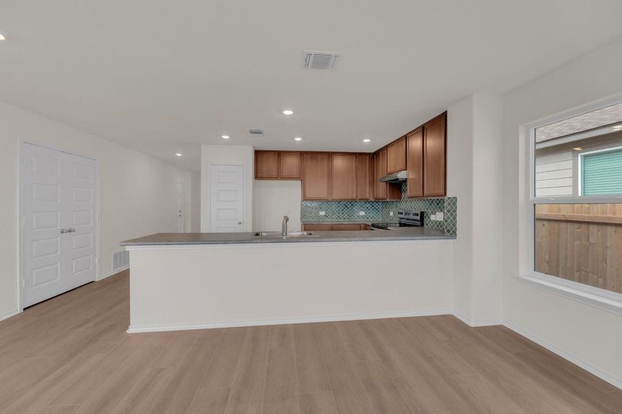 Furnished interior view inside a new home in Hidden Trails, Belton (Image 11).