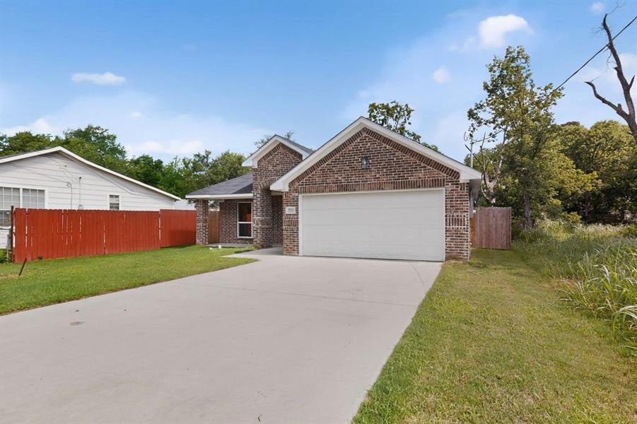 Front exterior of a new home in , Greenville, TX, highlighting curb appeal (Image 19). Front exterior of a new home in , Greenville, TX, highlighting curb appeal (Image 19).