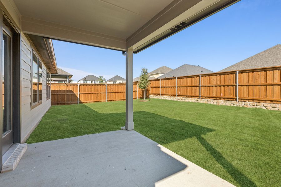 Patio in the Emmy II home plan by Trophy Signature Homes - REPRESENTATIVE PHOTO Patio in the Emmy II home plan by Trophy Signature Homes - REPRESENTATIVE PHOTO