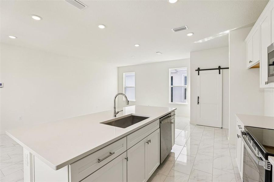 Furnished interior view inside a new home in Trinity Place, St. Cloud (Image 7).