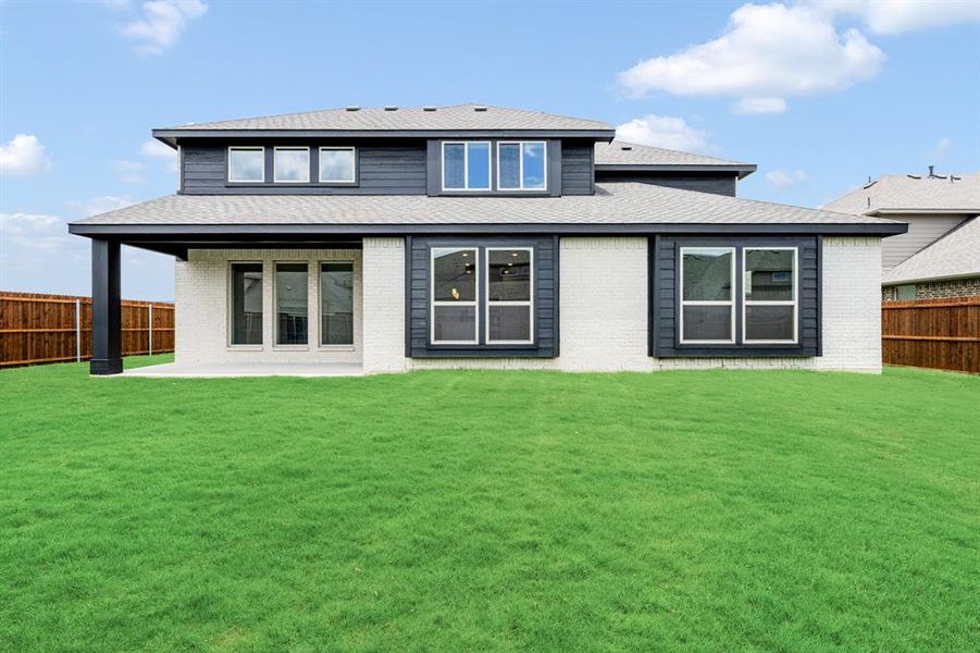 Front exterior of a new home in The Oaks, Red Oak, TX, highlighting curb appeal (Image 1).