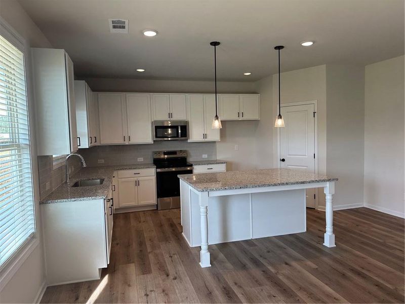 Furnished interior view inside a new home in Beckett Ranch, Auburn (Image 4).