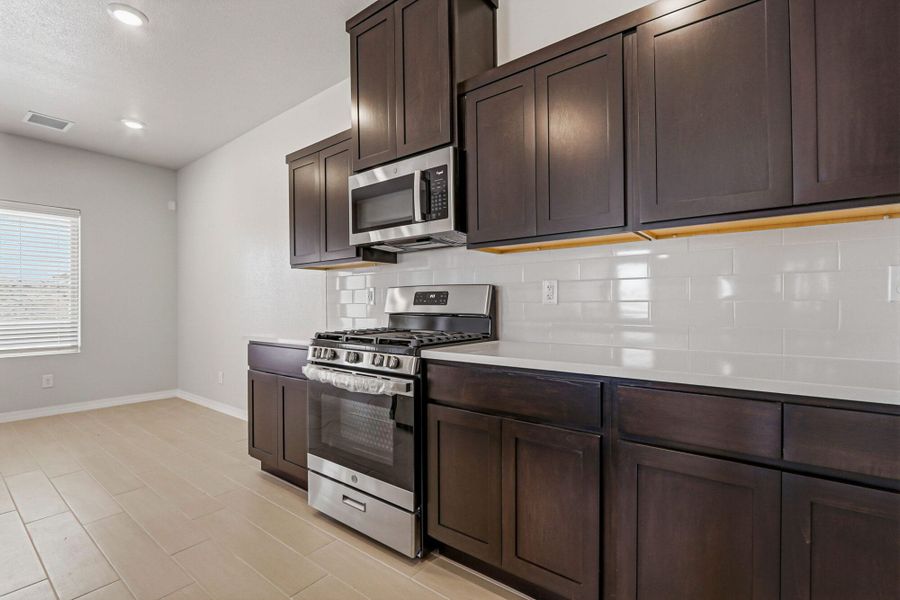Representative furnished interior of a home built from the Poppy by View Homes in Paseos Del Este, El Paso (Image 14).