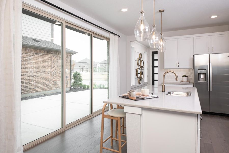 Representative furnished interior of a home built from the Bergamot by Tri Pointe Homes in Union Park, Little Elm (Image 6).