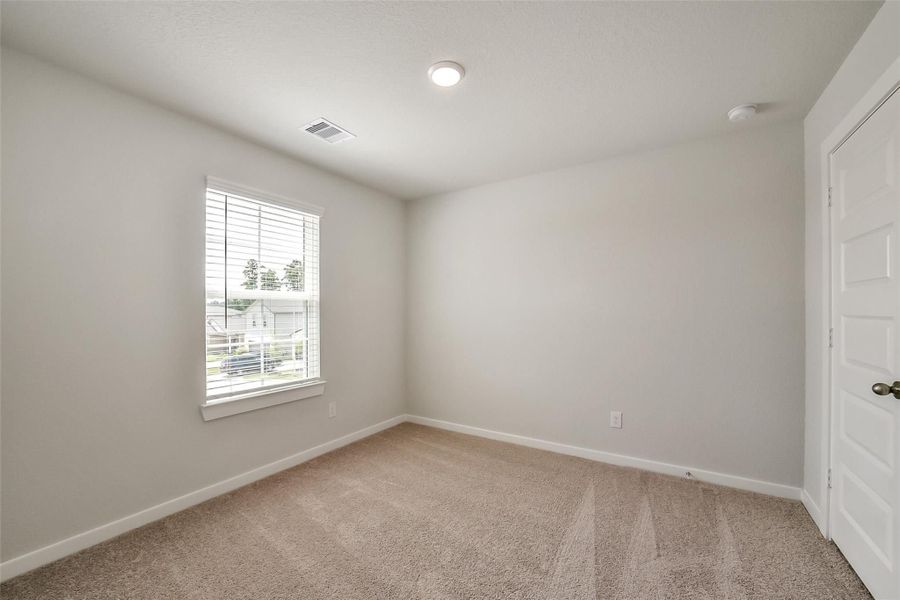 Spacious, unfurnished interior of a new home in Lakes at Black Oak, Magnolia (Image 28).