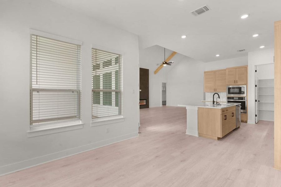 Furnished interior view inside a new home in The Grove at Blackhawk, Pflugerville (Image 13).