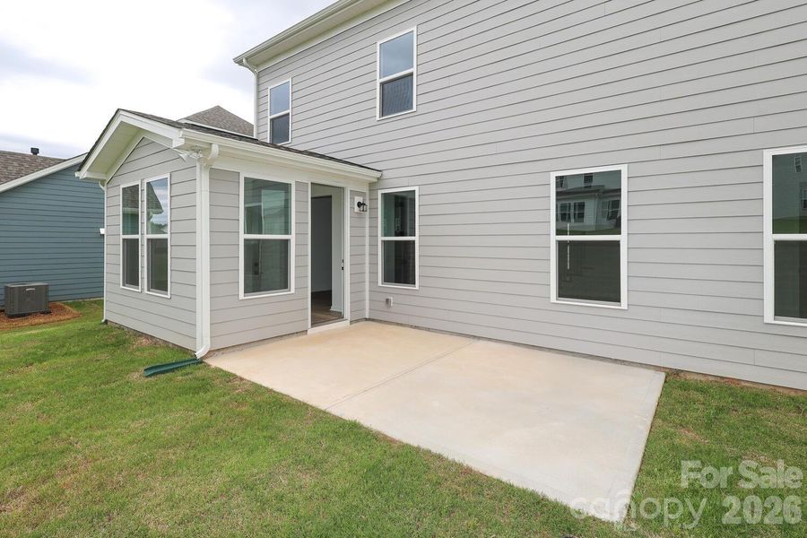 Exterior details and patio area of a home in Estates at Sugar Creek, Indian Land (Image 25).