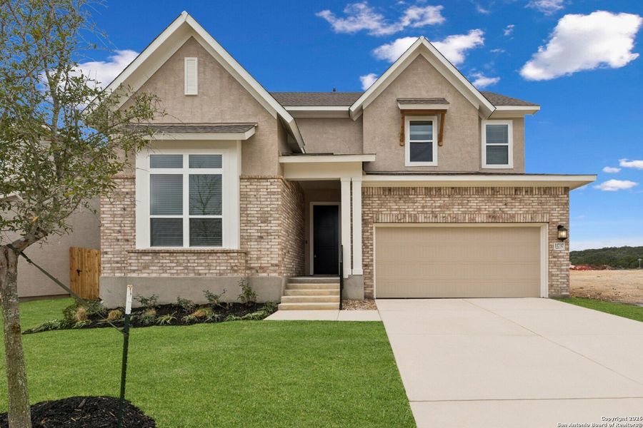 Front exterior of a new home in Davis Ranch 50', San Antonio, TX, highlighting curb appeal (Image 19).