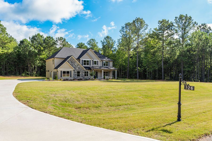 Front exterior of a new home in Flint Farms, Concord, GA, highlighting curb appeal (Image 26).