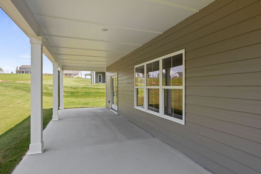 Exterior details and patio area of a home in Cherokee Knoll, Williamston (Image 4).