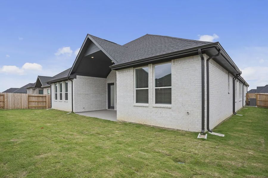 Exterior details and patio area of a home in Attwater 65's, Waller (Image 4).