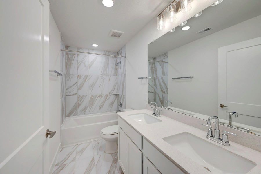 Furnished interior view inside a new home in Sorella, Tomball (Image 9).