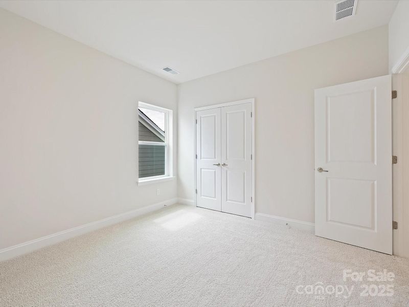 Spacious, unfurnished interior of a new home in Encore at Streamside - Classic Series, Waxhaw (Image 23).