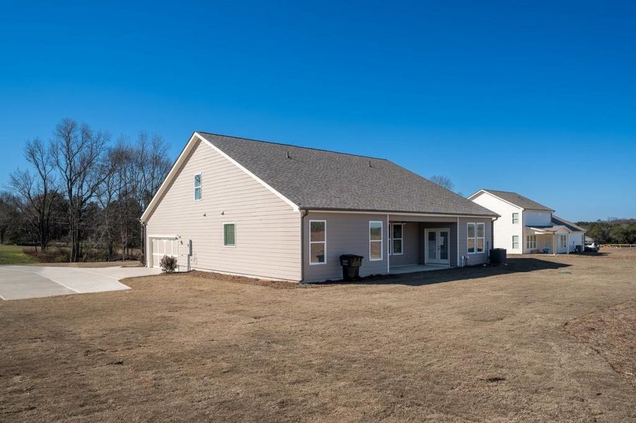 Exterior details and patio area of a home in Magnolia Ridge, Monroe (Image 30).