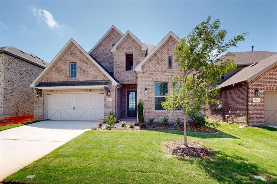 Front exterior of a new home in Lilybrooke at Legacy Hills, Celina, TX, highlighting curb appeal (Image 1). Front exterior of a new home in Lilybrooke at Legacy Hills, Celina, TX, highlighting curb appeal (Image 1).