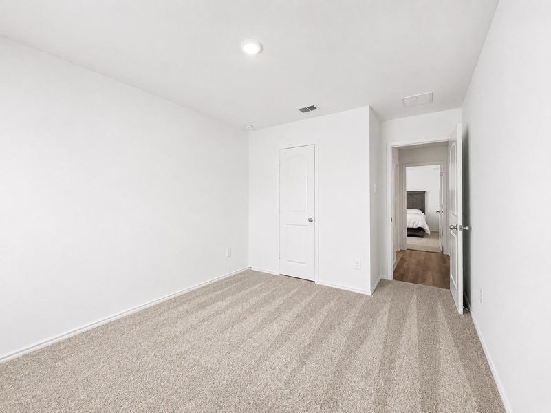 Spacious, unfurnished interior of a new home in Summerwood Trails, Willis (Image 23). Spacious, unfurnished interior of a new home in Summerwood Trails, Willis (Image 23).