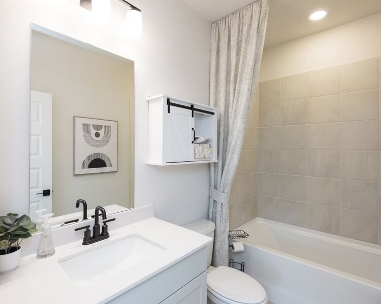 Furnished interior view inside a new home in Hemingway - Reserve Series, Cumming (Image 8). Furnished interior view inside a new home in Hemingway - Reserve Series, Cumming (Image 8).