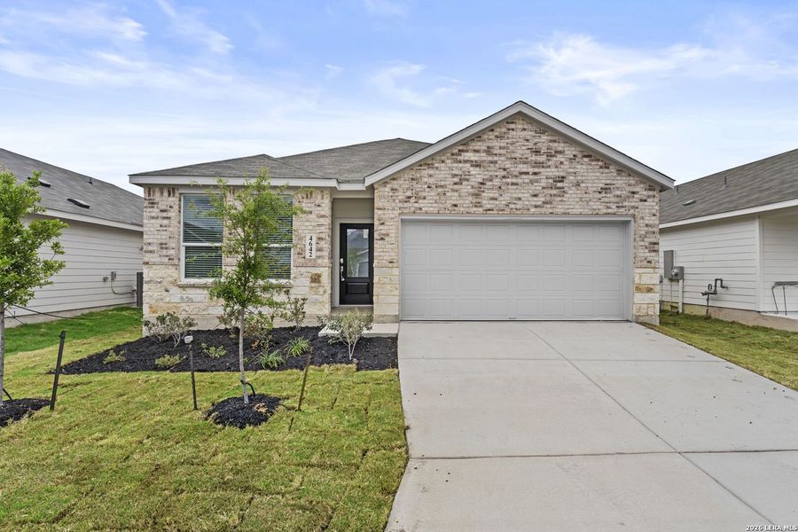 Front exterior of a new home in Legacy Point, Von Ormy, TX, highlighting curb appeal (Image 2).