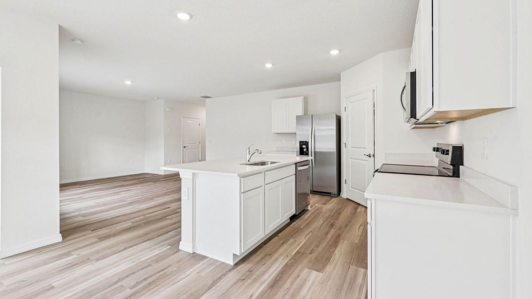 Representative furnished interior of a home built from the Darwin by D.R. Horton in Ocala Crossings South, Ocala (Image 16).