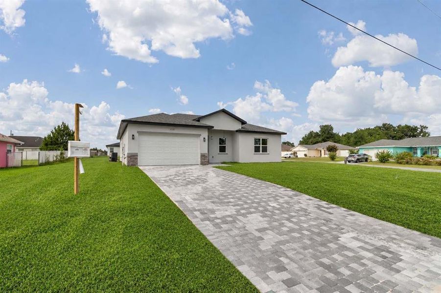 Front exterior of a new home in , Ocala, FL, highlighting curb appeal (Image 20). Front exterior of a new home in , Ocala, FL, highlighting curb appeal (Image 20).