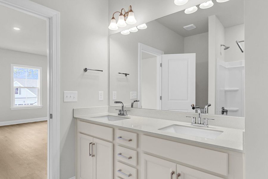 Furnished interior view inside a new home in Tidewater at Lakes of Cane Bay, Summerville (Image 16).