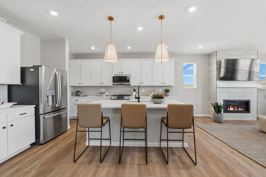 Representative furnished interior of a home built from the 4008 by Risewell Homes in Harvest Crossing, Aurora (Image 4).