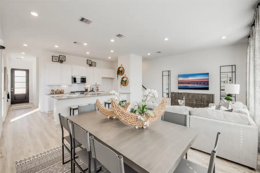Furnished interior view inside a new home in Bridgeland, Cypress (Image 31).
