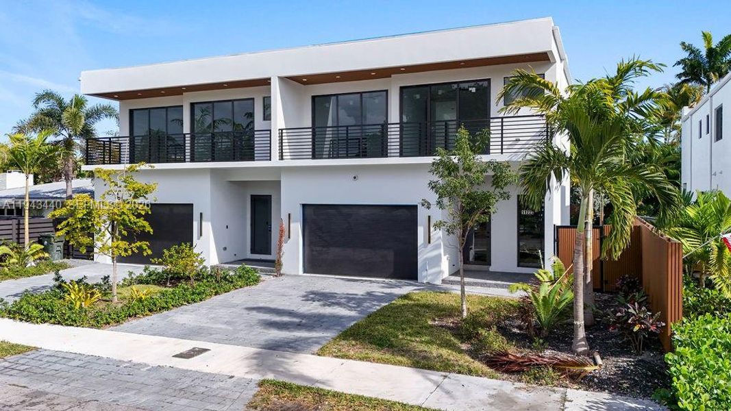 Front exterior of a new home in , Fort Lauderdale, FL, highlighting curb appeal (Image 30). Front exterior of a new home in , Fort Lauderdale, FL, highlighting curb appeal (Image 30).