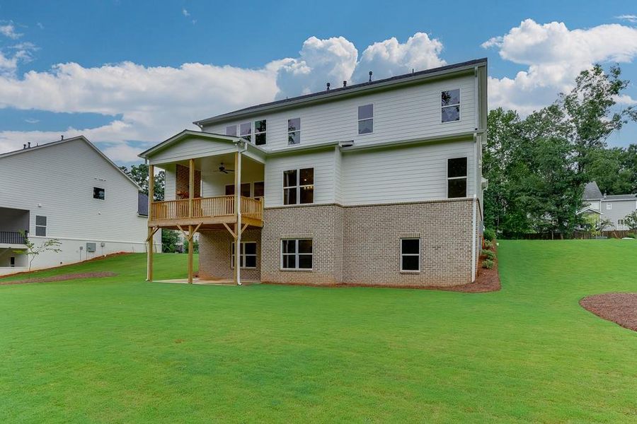 Front exterior of a new home in , Sugar Hill, GA, highlighting curb appeal (Image 23). Front exterior of a new home in , Sugar Hill, GA, highlighting curb appeal (Image 23).