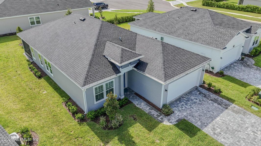 Front exterior of a new home in Stillwater | Active Adult 55+: Stillwater (50s) - Royal Collection, St. Johns, FL, highlighting curb appeal (Image 23). Front exterior of a new home in Stillwater | Active Adult 55+: Stillwater (50s) - Royal Collection, St. Johns, FL, highlighting curb appeal (Image 23).