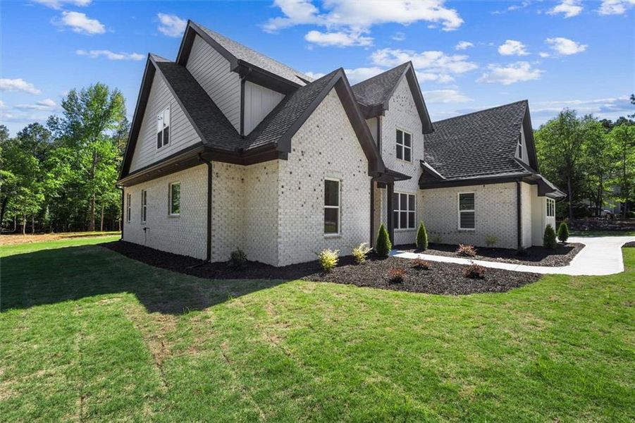 Front exterior of a new home in , Hull, GA, highlighting curb appeal (Image 31).