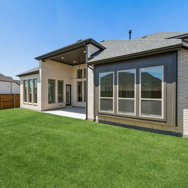 Exterior details and patio area of a home in The Parks at Wilson Creek, Celina (Image 27).