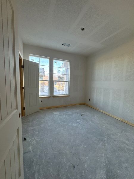 In-progress construction of a new home in Terra Escalante, Blue Ridge, TX (Image 12).