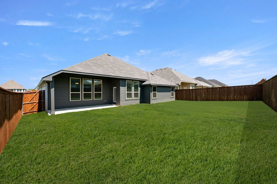 Front exterior of a new home in Still Water Lake Estates, Godley, TX, highlighting curb appeal (Image 27).