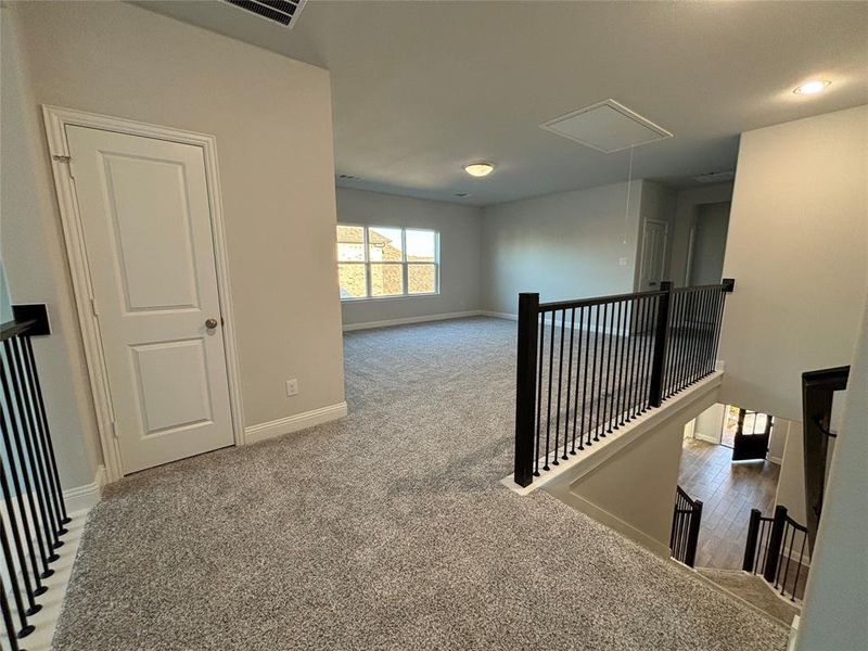 Corridor with carpet floors